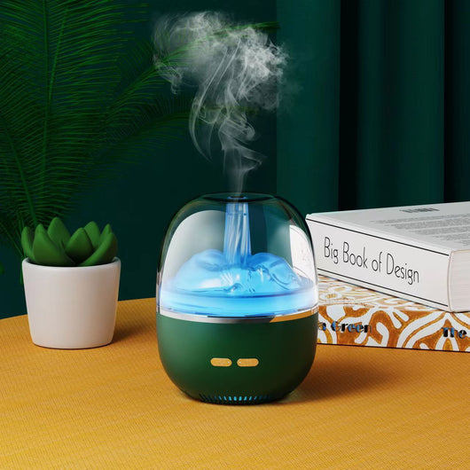 White essential oil diffuser and humidifier with a clear dome top, glowing red inside, and blue LED base light. - Image 8