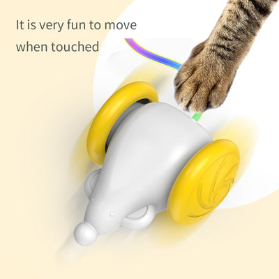 White and blue interactive cat toy shaped like a mouse with large wheels and a colorful, luminous tail. - Image 17