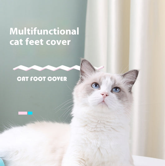 Four teal rubber cat paw covers with white hook-and-loop straps and paw print details, designed for anti-scratch protection. - Image 7