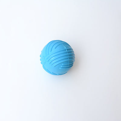Sapphire blue TPR dog sound ball with a textured surface for teeth grinding and biting. - Image 3
