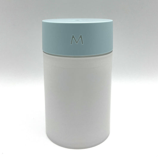 M Style mini humidifier with a light blue top and translucent white body, suitable for bedroom or office. - Image 3