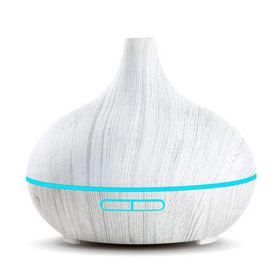 Wood grain ultrasonic aromatherapy diffuser and humidifier with a glowing blue LED light band and control buttons. - Image 8