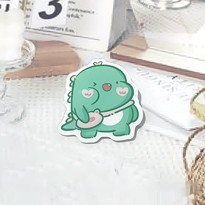 Cute green cartoon dinosaur acrylic badge brooch with a shy expression and small spikes on its back. - Image 11