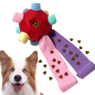 Purple hollow-out pet dog toy ball with colorful fabric protrusions for biting and smelling activities.