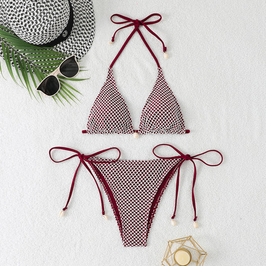 Blue and white mesh triangle bikini set with tie-side bottom and shell accents, displayed on a white beach towel. - Image 10