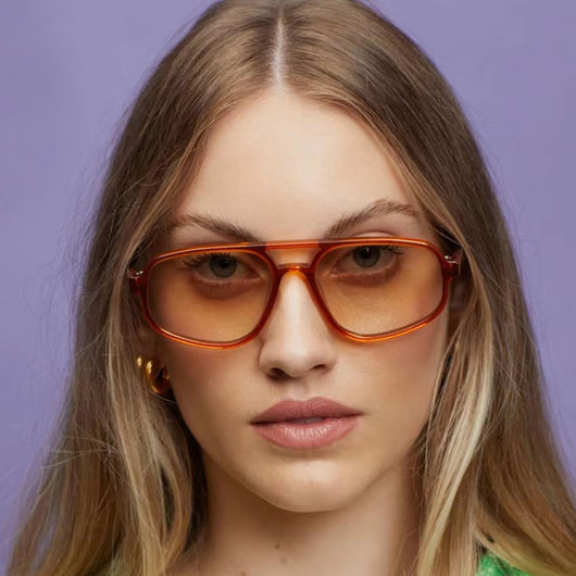Men's fashion tortoise shell double beam sunglasses with brown oval lenses on a white background. - Image 15