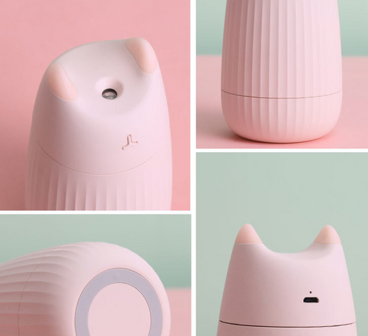 Pink cat-shaped humidifier with pointed ears and a ribbed texture on the lower body, ideal for desktop use. - Image 7