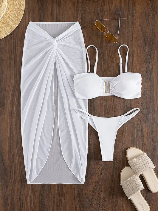 Bright green three-piece bikini set with a ruched bandeau top, matching bottoms, and a sheer knotted sarong skirt. - Image 3