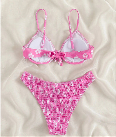 Periwinkle blue two-piece swimsuit with white floral pattern and ruched texture, featuring an underwire bikini top and high-cut bottoms. - Image 13
