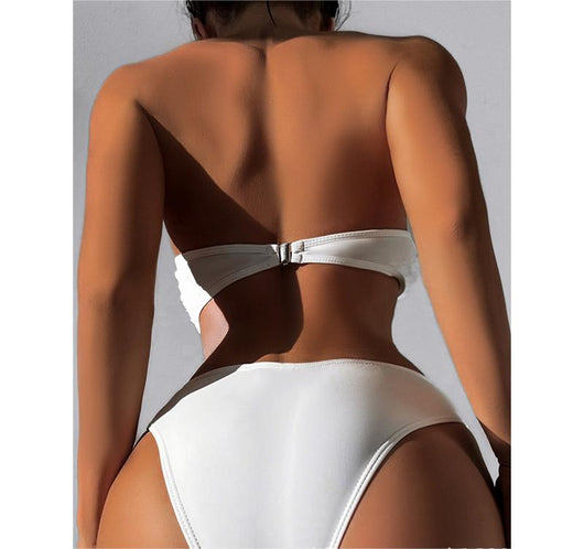 White tube top bikini swimsuit with 3D floral appliques and high-waisted bottom, modeled on a person. - Image 3