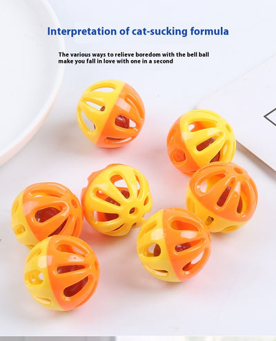 Five colorful plastic pet bell balls in red, yellow/orange, lime green, and hot pink, with hollow designs. - Image 11