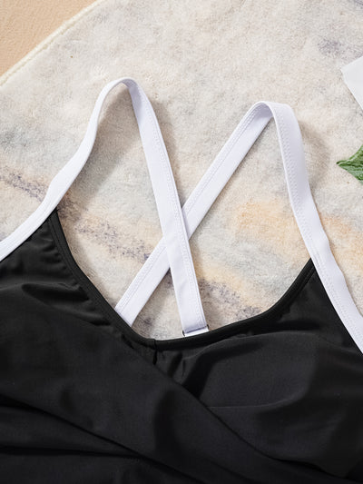 Black and white color matching bikini swimsuit with a high-waisted drawstring bottom and a split top. - Image 10