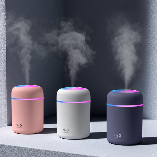 Navy car USB humidifier with a colorful LED light ring and top, displaying "H₂O HUMIDIFIER" text. - Image 11