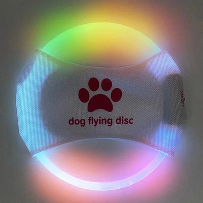 Red LED light-up dog flying disc with a white paw print logo and "dog flying disc" text. - Image 9