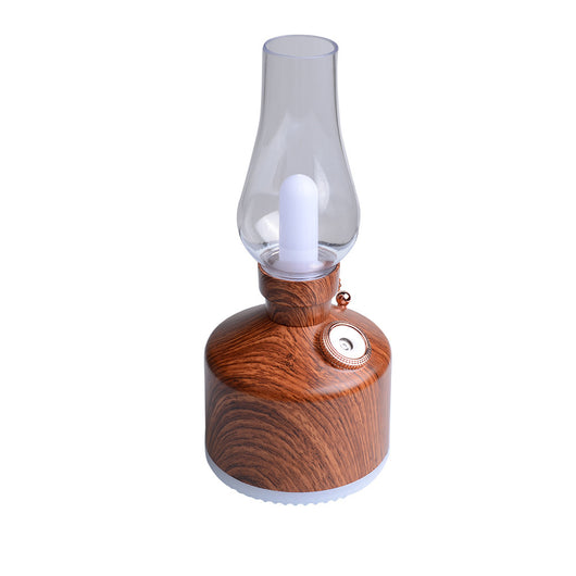 Wood grain kerosene lamp air humidifier with a clear glass-like top and a white light element, featuring a gold control knob. - Image 6