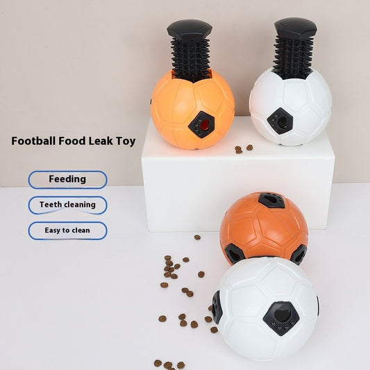 White and black dog toy with a soccer ball base and a textured rod for nibbling and teeth grinding.