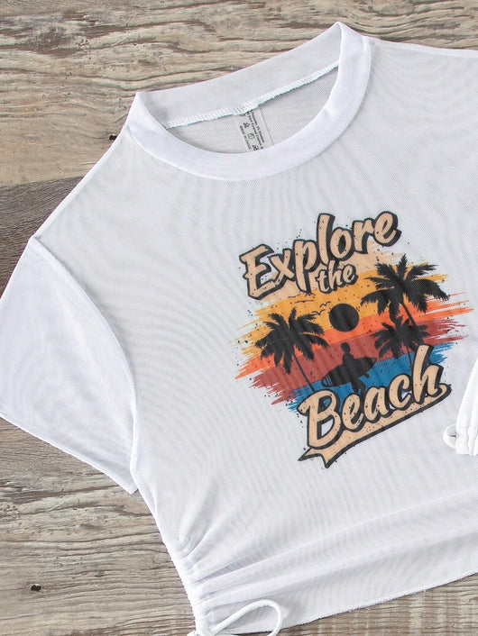 Black three-piece swimsuit with a mesh crop top featuring an "Explore the Beach" graphic, bikini top, and high-waisted bottoms. - Image 31