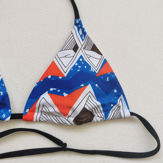 Red, white, and blue geometric print bikini with a triangle top and high-waisted, high-cut bottom. - Image 20
