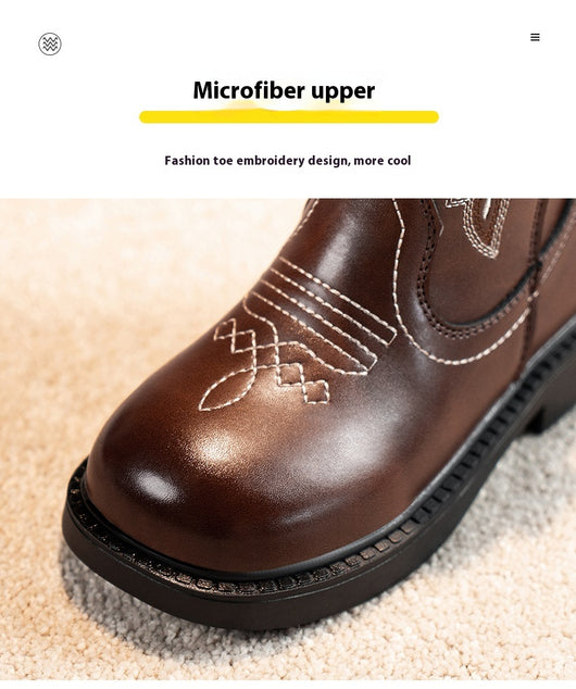 Girls' brown Martin boots with white ethnic embroidery, side zippers, and black soles, displayed on a light carpet. - Image 27