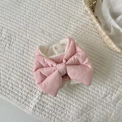 Creamy-white plush dog harness with a large decorative bow on the back, worn by a small poodle-like dog. - Image 17