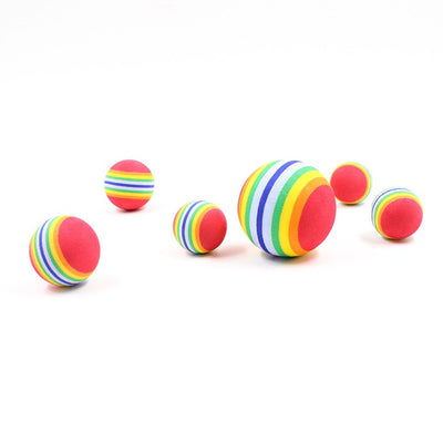 Set of three red pet play balls with rainbow stripes in varying sizes, made from soft EVA material. - Image 12