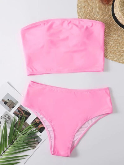 Vibrant orange strapless bandeau bikini top and high-waisted bottoms set, worn by a woman with a white shirt. - Image 28