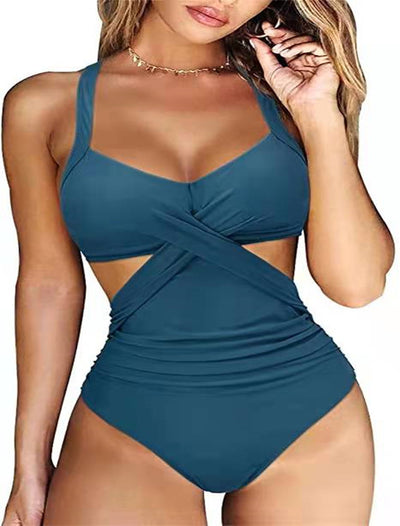 Women's teal halter bikini top with a twisted front and high-waisted bottoms featuring a blue and green tropical leaf print. - Image 12