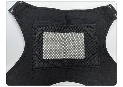 Man wearing a black electric heating shoulder pad with adjustable straps for therapeutic warmth and support. - Image 9