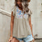 Blusa Blanca de Algodón con Volantes y Panel Bordado