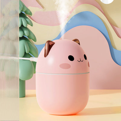 Three cute cat-shaped humidifiers in white, green, and pink, each with three filter sticks. - Image 15