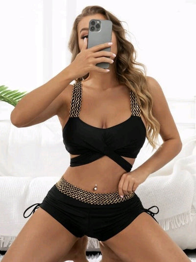Black high-waisted bikini with gold sequin straps and waistband. Features a wrap-around top and boy short bottoms. - Image 5