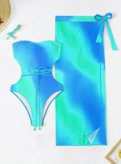 Blue ombre one-piece swimsuit with side cutouts and a matching blue ombre sarong with tie closure. - Image 10