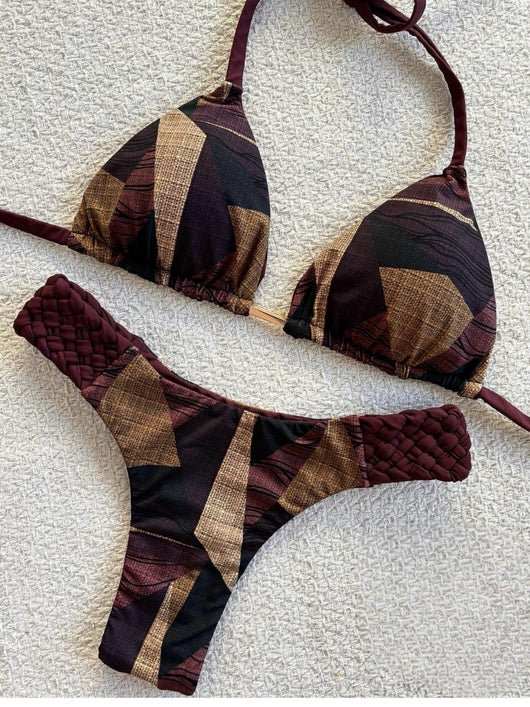 Women's blue, white, and gold marble print bikini with a triangle halter top and braided rope side details. - Image 19