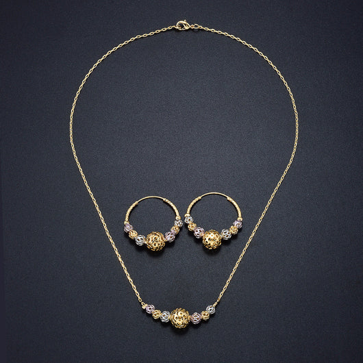 Multicolor cutout round beads necklace and matching hoop earrings set with gold, silver, and purple beads. - Image 7
