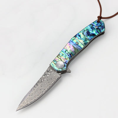 Cuchillo de Acero Damasco con Mango de Concha de Color - Image 5