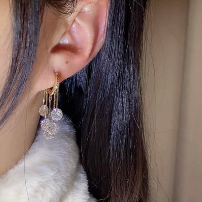 Aretes de Lujo Minimalista con Borlas en Tono Durazno - Image 5