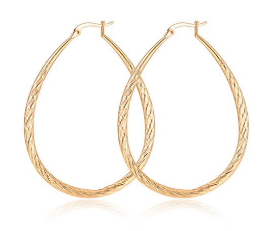 Aretes Dorados en Gota con Textura y Acabado Mate - Image 7