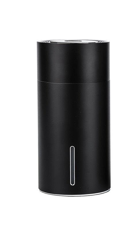 Black cylindrical vehicular humidifier with a silver trim and a vertical indicator light on a white background. - Image 3