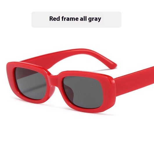 Children's small frame oval sunglasses with a solid white PC frame and brown AC lenses for UV protection. - Image 11