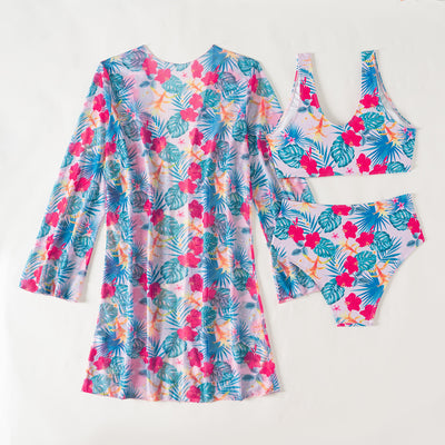 Multicolor tropical print three-piece swimsuit set with high-waisted bikini and sheer mesh cover-up on a beach. - Image 31