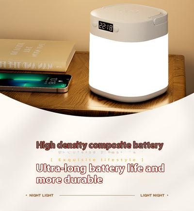 White rechargeable LED table lamp with a digital clock display and a light gray carrying handle. - Image 24