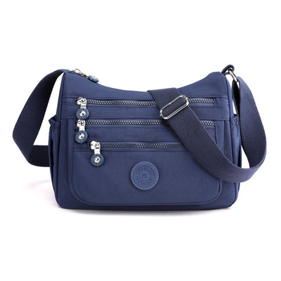 Bolsa Crossbody de Nylon de Gran Capacidad con Múltiples Compartimentos - Image 9