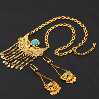 Gold-toned necklace and dangle earrings set with filigree water droplet design, turquoise accents, and tassel charms. - Image 7
