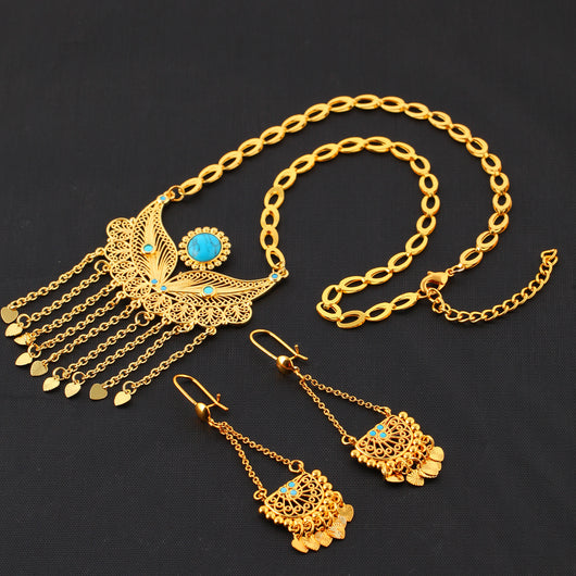 Gold-toned necklace and dangle earrings set with filigree water droplet design, turquoise accents, and tassel charms. - Image 7