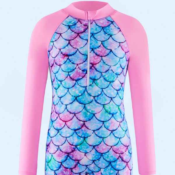Children's long-sleeve swimsuit with a colorful floral print body and solid pink raglan sleeves, featuring a front zipper.