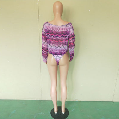 Woman in a purple and pink snakeskin print three-piece swimsuit with an off-shoulder crop top and high-waisted bottoms. - Image 24