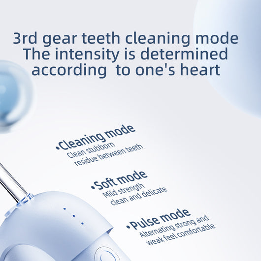 White portable electric dental water flosser with a clear nozzle and retractable water tank for oral hygiene. - Image 13