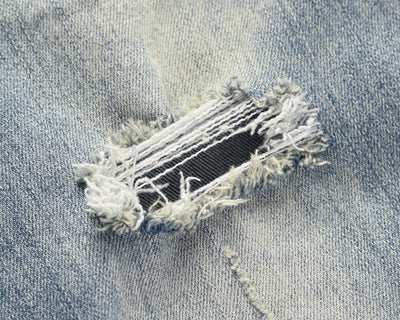 Jeans Azules Rotos con Desgaste Vintage - Image 16