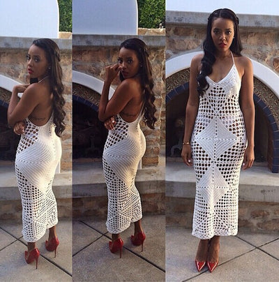 Woman wearing a white hollow-knit one-piece swimsuit with spaghetti straps and a geometric crochet pattern. - Image 5