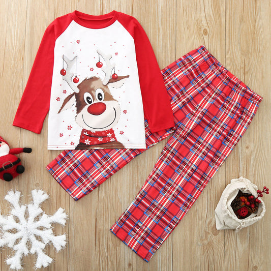 Red and white family Christmas pajamas with a reindeer graphic on the tops and red plaid pants, including a baby romper and hat. - Image 2